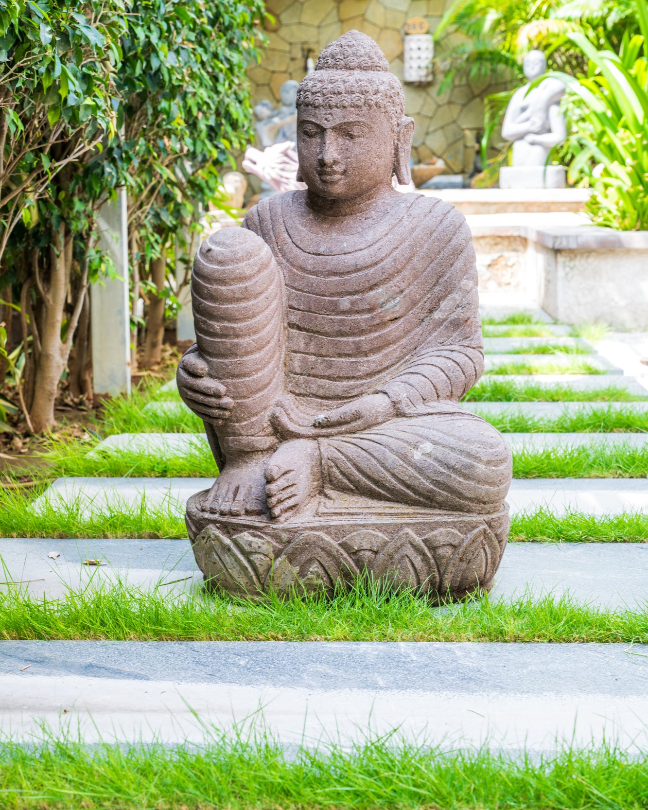 Crimson Buddha Stone Statue
